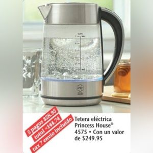 Electric kettle princess house 93/4”H w/lid and base 6”D
Blue LED lights